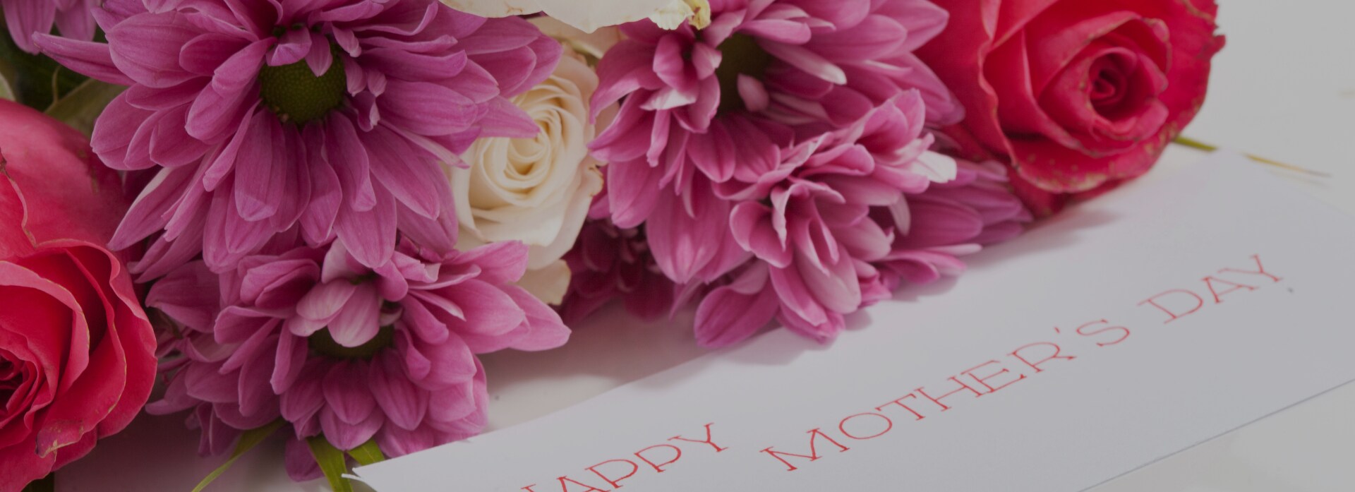 Pink and purple bouquet with Mother's Day card